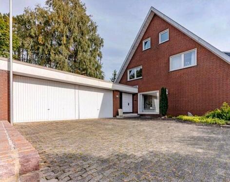 Foto - Einfamilienhaus mit Einliegerwohnung