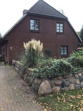 Foto - Einfamilienhaus mit Wohnung im OG