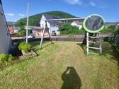 Foto - Tolle Erdgeschoßwohnung im Birkenweg mit Terrasse und Garage eigener Garten sowie Einbauküche