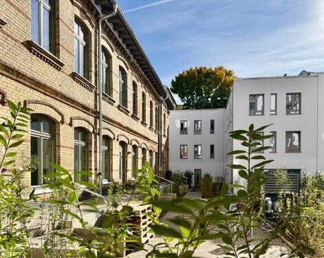 Foto - Erstbezug: charmante Maisonette mit Terrasse in historischer Remise