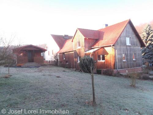 Foto - Kl. Einfamilienhaus in ruhiger Lage - mit Grünfläche, Gartenhaus und Garage