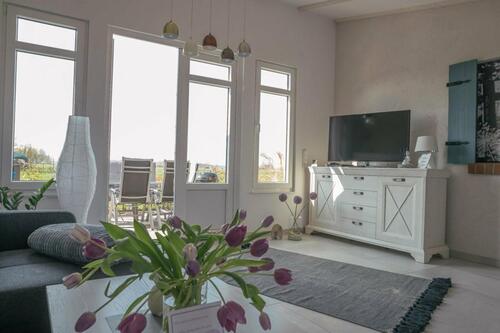 Foto - Ferienhaus 4* mit Sauna, Fitness, Fahrrädern, Wallbox, Garten