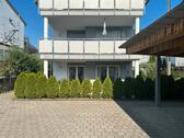 Foto - 2,5-Zimmer-EG-Wohnung mit Wintergarten und Carport