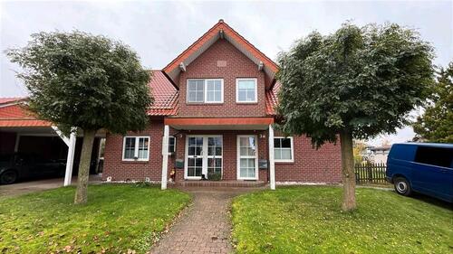 Foto - Doppelhaushälfte mit Carport und Stellplatz