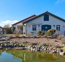 Bungalow mit Carport und idyllischem Traumgarten - Gnarrenburg