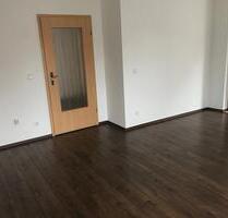 Eigentumswohnung in Rühen – 3 Zimmer, Balkon, Garten und Carport
