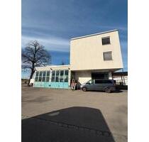 Mehrfamilienhaus mit Gewerbeeinheit in Augsburg