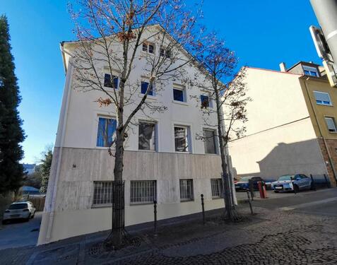 Foto - Modernisiertes Mehrfamilienhaus - Entwicklungspotential