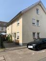 Foto - Zwei nebeneinanderliegende DHH zentral in Bodenheim