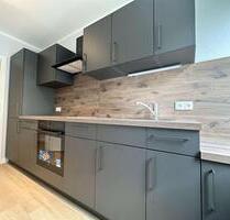 Sanierte 3-Zimmer-Wohnung mit moderner Einbauküche und PKW-Stellplatz - Sanitz