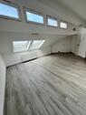 Foto - Zwei Zimmer, Dachgeschosswohnung mit Tiefgarage
