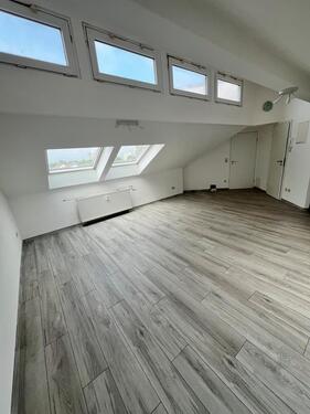 Foto - Zwei Zimmer, Dachgeschosswohnung mit Tiefgarage