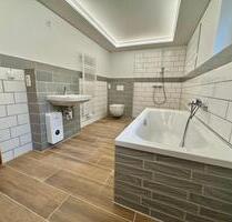 Erstbezug nach Komplettsanierung: Moderne 3-Zimmer-Souterrainwohnung mit Tageslicht, Fußbodenheizung & Stellplatz - Neustrelitz