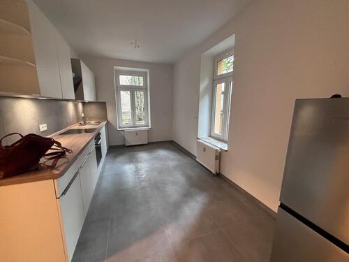 Foto - Große 2-Zimmer Wohnung mit EBK, Terasse und Gartenanteil