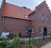 Neuwertige Obergeschosswohnung im Zentrum mit Fahrstuhl - Moormerland