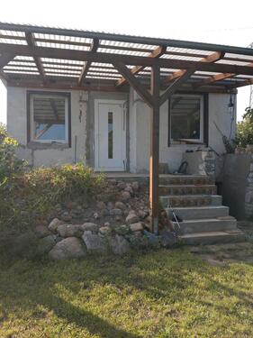 Foto - Idyllischer Garten mit Weitblick und direktem Parkplatz davor.