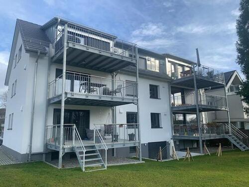 Foto - 2-Zimmer-Dachgeschoss mit EBK, großen Süd-Balkon, Geothermie und 1 Außenstellplatz