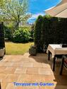 Foto - Erdgeschosswohnung über 2 Etagen mit Garten und TG (Insg. 100qm)