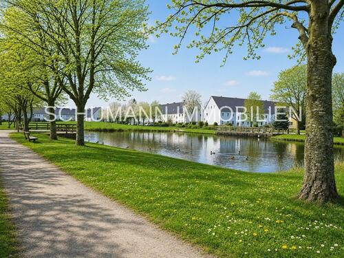 Foto - Attraktive 2-Zimmer-Wohnung mit großzügigem Raumangebot in grüner Wohnlage von Sande-Neufeld
