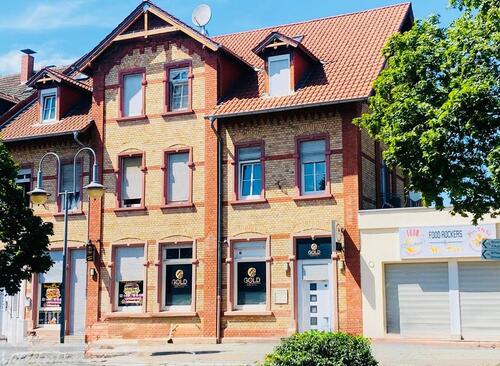 Foto - 2 Wohnhäuser mit 9 Wohnungen und 3 Gewerbeeinheiten
