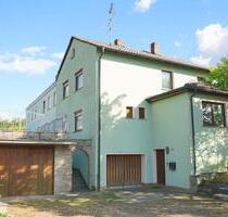 Massivhaus in ruhiger Ortsrandlage – 2.365 m² Grundstück mit 1.2 - Ippesheim