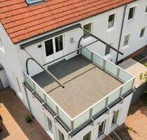 Großzügige 3,5-Zimmer-Wohnung mit Dachterrasse, Kamin & Einbauküche in zentraler Lage - Neustadt am Rübenberge