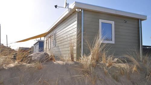 Foto - Ferienhaus Nordlicht - Häuschen mit Dünenblick und Relaxliegen