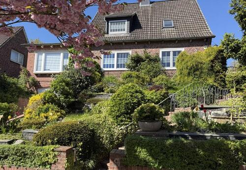 Foto - Großzügiges Einfamilienhaus mit Einliegerpotenzial und Garten