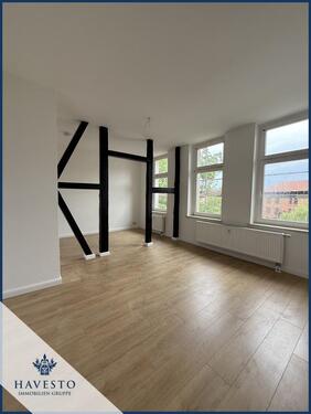 Foto - Charmanter Altbau mit sichtbaren Holzbalken – frisch renoviert & modernisiert mit Einbauküche!