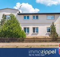Anlageobjekt in Britz b.Eberswalde: MFH mit 5 Wohnungen, 5 Garagen, voll vermietet, 1.407 m² Grdstck - Chorin