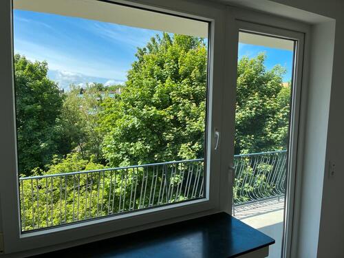 Foto - Attraktive 2-Zimmer-Wohnung mit Balkon, Wintergarten & EBK