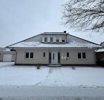 Attraktive Erdgeschosswohnung mit Kamin, zwei Terrassen + Garage - Friesoythe