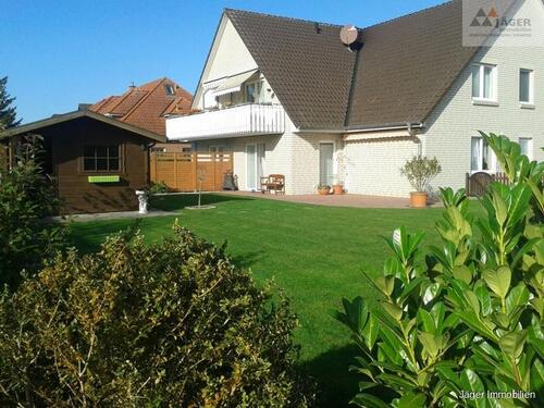 Foto - Moderne Wohnung in gepflegtem Vierparteienhaus