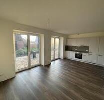 Erstbezug | Helle energieeffiziente Neubauwohnung mit Garten - Wanna