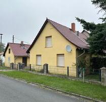 Kleines Grundstück mit Nebengelass und Einfamilienhaus - Luckau