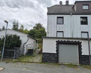Doppelhaushälfte mit Garten, 2 Garagen & Werkstatt in Elsterberg