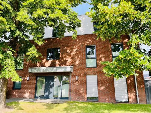 Foto - Moderne Erdgeschosswohung mit Garage und Garten