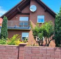 Zweifamilienhaus mit Garten, Garage und Terrassen in Triangel - Sassenburg