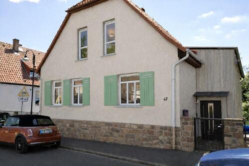 Foto - Einfamilienhaus mit Garage und Werkstatt freistehend