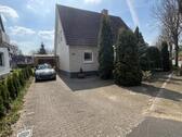 Foto - Teilunterkellerters Einfamilienhaus mit großzügigem Garten