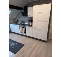 Remels, schöne Dachgeschosswohnung im Herzen von Remels - Uplengen