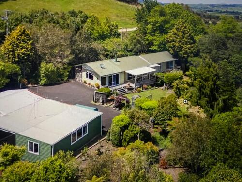 Foto - Haus in Neuseeland mit wunderschöne Garten