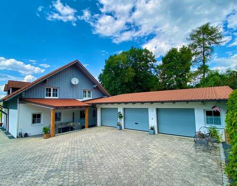 Foto - Vielseitiges Einfamilienhaus mit zwei Wohneinheiten