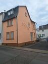 Foto - Kleines Haus mit Nebengebäude und Garage als Kapitalanlage