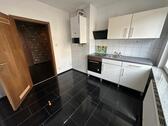 Foto - 2 Zi. Wohnung 1 O.G. mit Einbauküche in Duisburg Beeck