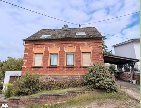 Foto - Einfamilienhaus mit Entwicklungspotenzial