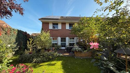 Foto - Familienfreundliches Reihenendhaus mit Garten & Carport
