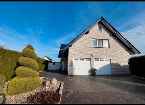 Foto - Einfamilienhaus mit Einliegerwohnung