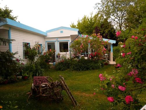 Foto - Idyllische Einfamilienhaus in Bungalowstil mit Rosengarten