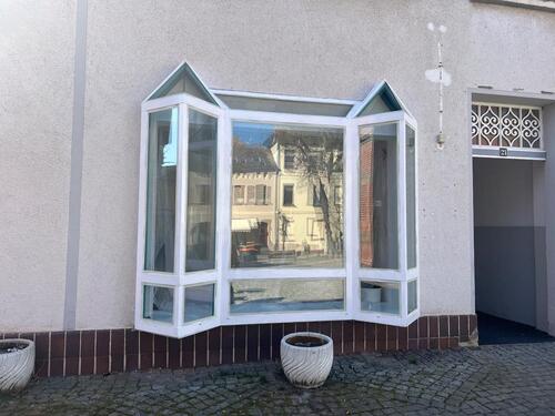 Foto - Teilsaniertes Mehrfamilienhaus mit Gewerbe